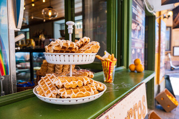 Yummy waffles in Stockholm downtown Gamla Stan, soft focus street vendor