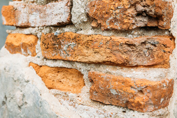 Brick wall with red brick.Texture of a stone wall. Antique brick texture.