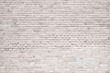 White old brick wall with traces of mortar repair. Retro brickwall texture background