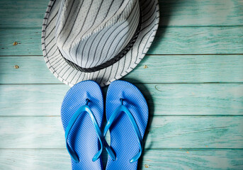 flip-flops and a striped hat