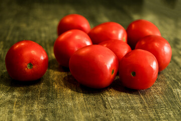 Market of Provence. A case of red tomatoes. Big plan.