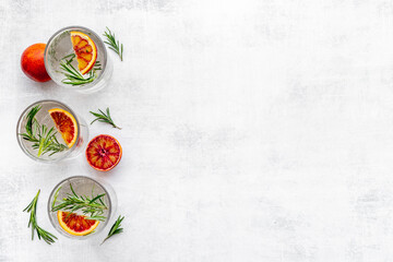 Citrus sangria or lemonade with blood red oranges and ice