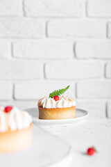 Lemon tart with merengue and strawberries