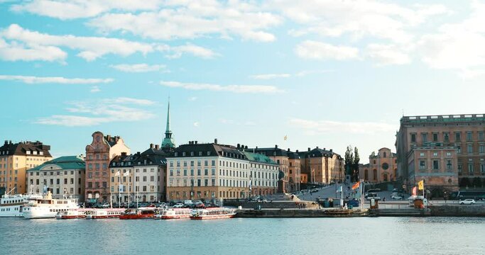 Stockholm, Sweden. Scenic Famous View Of Embankment In Old Town Of Stockholm At Summer. Gamla Stan In Summer Evening. Famous Popular Destination Scenic Place And UNESCO World Heritage Site