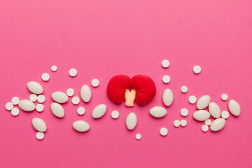 Kidneys of human on pink background. Pain in the genitourinary system, treatment of kidney stones. Chronic and genetic problems.