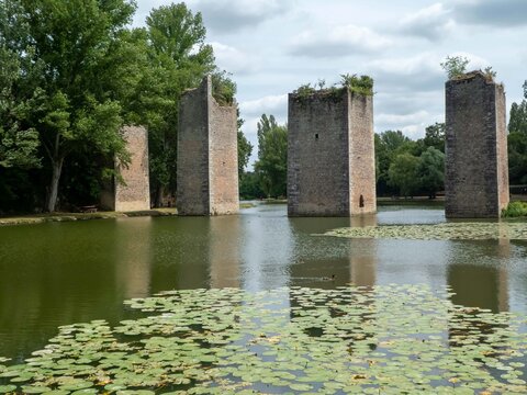 ruins of the old bridge at Lussac Les Chateau in France