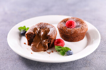 Fototapeta na wymiar chocolate cake fondant and berry fruit