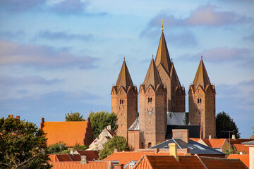 Church of Our Lady in Kalundborg, Denmark. It has five distinctive towers, and stands on a hill...