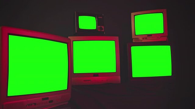 Retro TVs turning on Green Screens. Red Tone. Zoom In. 