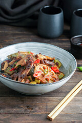 Lotus root or Rhizome stir-fry with Shiitake mushrooms, spices, hot peppers, dark soy sauce and green onions