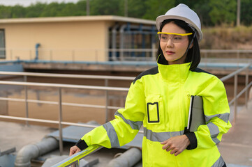 Environmental engineers work at wastewater treatment plants,Water supply engineering working at Water recycling plant for reuse