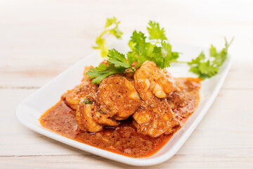 Garlic shrimp stir-fry on white plate; easy and delicious menu. 