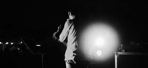 saxophone player in live concert back stage concentration artist moment concept.