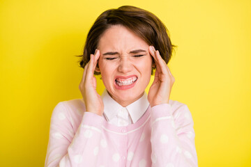 Photo of young girl hands touch head headache pain suffer sick isolated over yellow color background