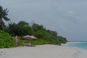 the sandy coast of a coral island in the Indian Ocean