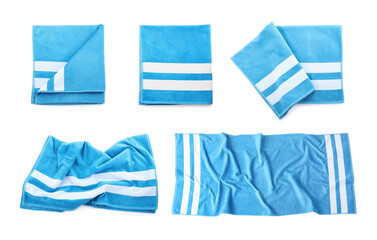 Set with soft towels on white background, top view