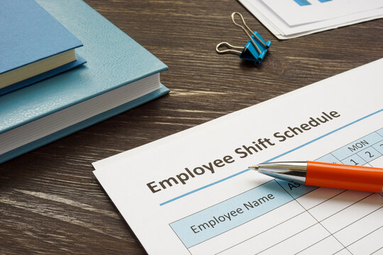 Employee shift schedule for work and pen.