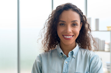 Portrait of young african businesswoman smiling in modern office