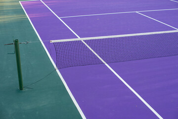 Colorful tennis court with purple painted surface