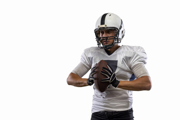Close-up young American football player, athlete posing isolated on white studio background. Concept of professional sport, championship, competition.