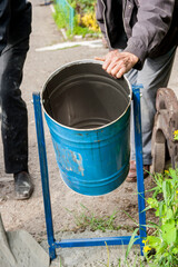 Blue landfill with workers