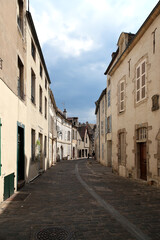 Fototapeta na wymiar Beaune, France. Medieval street in the historic center