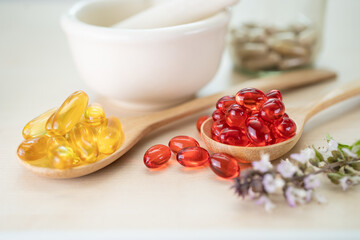 Alternative medicine herbal organic capsule with vitamin E omega 3 fish oil, mineral, drug with herbs leaf natural supplements for healthy good life.