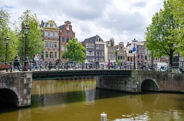 Foto op Plexiglas Brug op de hoek brouwersgracht - herengracht in Amsterdam © Holland-PhotostockNL