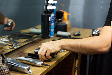 tools and razors of barbershop on a wooden desk