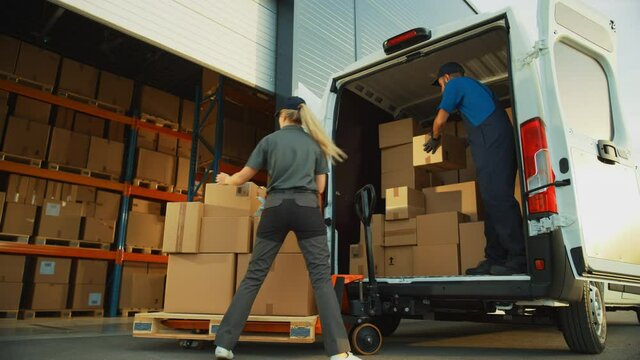 Outside of Logistics Distributions Warehouse: Diverse Team of Workers use Hand Truck Loading Delivery Van with Cardboard Boxes, Online Orders,  E-Commerce Purchases. Slow Motion Low Angle