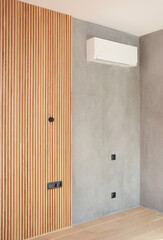 Modern living room design: The combination of wood paneling and gray venetian plastering, gray wall...