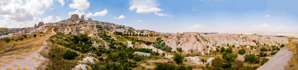 Fototapeta na wymiar Panoramic view of turkish Uchisar with houses and castle
