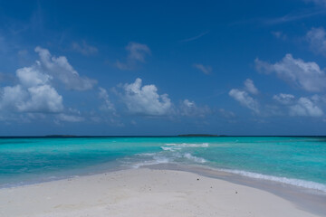 breathtaking view of the gorgeous sky from the pestled beach of the Maldives island on a clear day