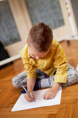 Young boy drawing