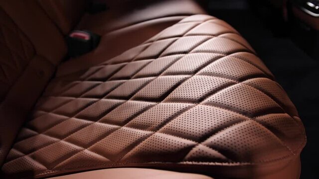 Brown leather interior of a luxury modern expensive car of the executive class S.