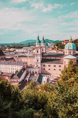 Fototapeta na wymiar A view of Salzburg city centre: old town, Cathedral, central square from the top of the city fortress. Austria, Europe