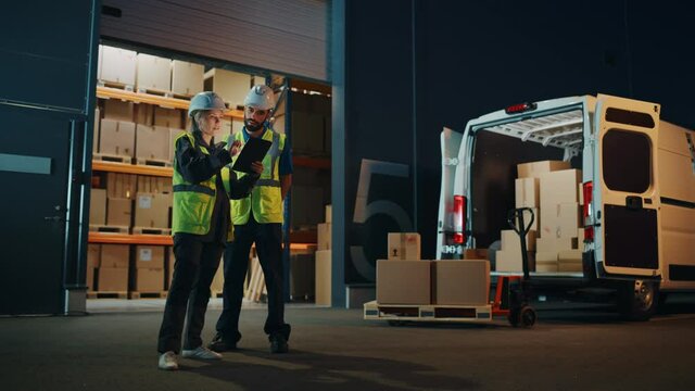 Outside of Logistics Distributions Warehouse With Inventory Manager Using Tablet Computer, talking to Worker. Delivery Truck with Cardboard Boxes, Online Orders, E-Commerce Food and Medicine Supply