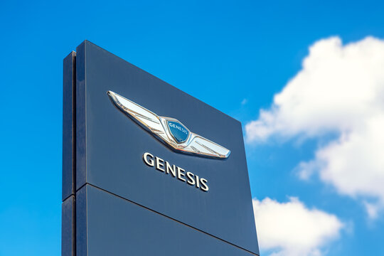 Moscow, Russia - July, 2021: Genesis automobile dealership Sign against blue sky. Genesis is the luxury vehicle division of the South Korean vehicle manufacturer Hyundai Motor Group.
