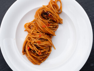Spaghetti all'Assassina Pasta, a Speciality from Bari, Puglia, Italy, Top View