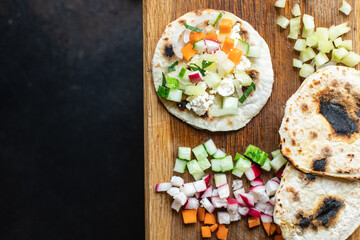 tacos vegetable doner kebab flatbread taco on the table healthy food meal snack copy space food background rustic. top view veggie vegan or vegetarian food
