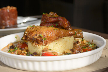 Delicious chicken and couscous with dried fruits. Traditional Moroccan cuisine.
