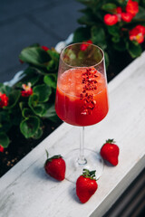 Cooling Rossini italian alcoholic cocktail with strawberry.