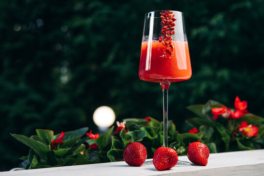 Cooling Rossini italian alcoholic cocktail with strawberry.