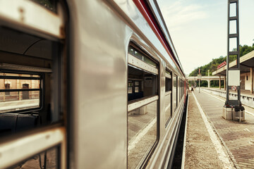 The cars of the electric train are at the final station