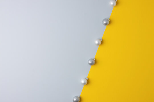 Christmas Grey And Yellow Minimal Background With Grey Ball. Flat Lay, Copy Space