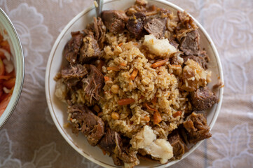 Pilaf - traditional dish with rice and meat.