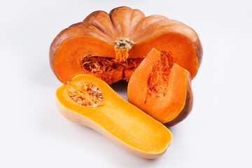 Close-up two different raw orange pumpkin isolated on white food background