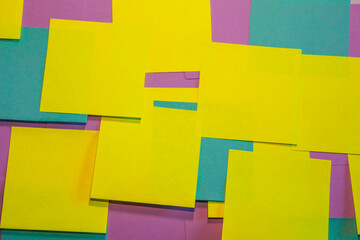 Collection of different colored sheets of note papers post it notes. Different stickers.