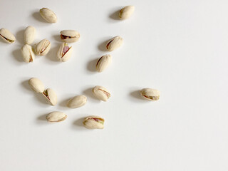 pistachio nuts close up white background