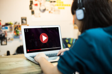 Online live video marketing concept.Woman Watching online video via laptop